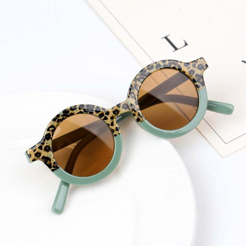 Children's Fashion Round Leopard Print Patchwork ShadesProduct Information:


 Material: PC
 
 Style: fashion retro
 
 Frame material: PC
 
 Lens material: resin
 
 Anti-UV grade: 400
 
 Visible light perspective rate: 80Stef's Store
